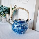 Handcrafted Japanese porcelain teapot hand painted in blue and white.