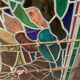 Stained glass panel representing a nineteenth century coronation