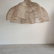 Huge rattan suspension in the shape of a corolla H:1m; D: 1m50
