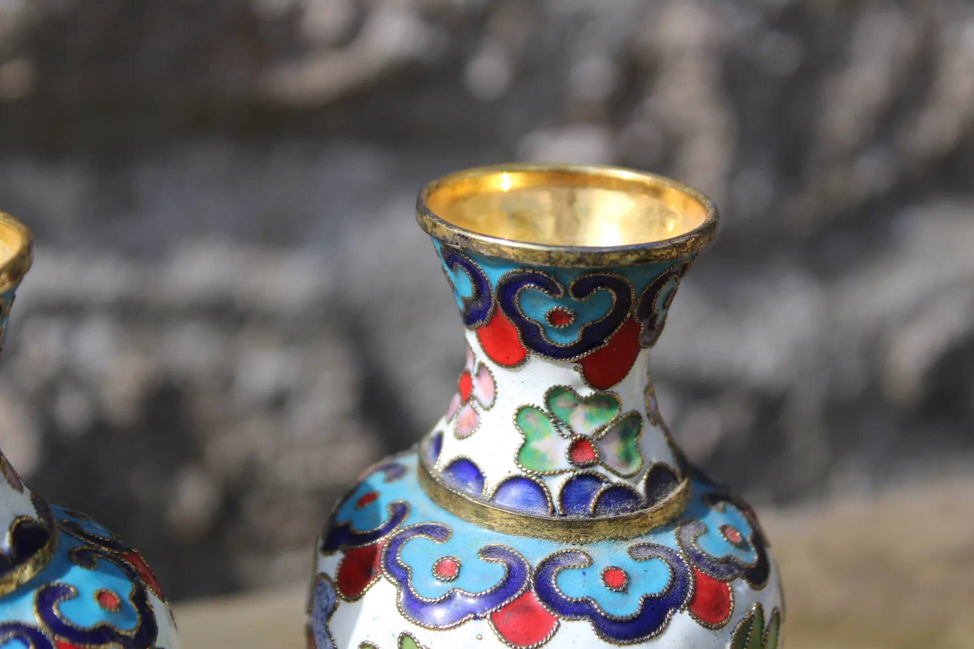 Two small vintage cloisonné enamel vases with Asian floral decoration.