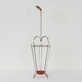 VINTAGE UMBRELLA STAND OF CURVED METAL, RED DETAILS AND A BAMBOO HANDLE, 1950S