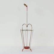 VINTAGE UMBRELLA STAND OF CURVED METAL, RED DETAILS AND A BAMBOO HANDLE, 1950S