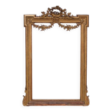Large mirror in a gold frame, France.