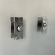 Pair of vintage wall lights, chrome-plated metal, France 1970.