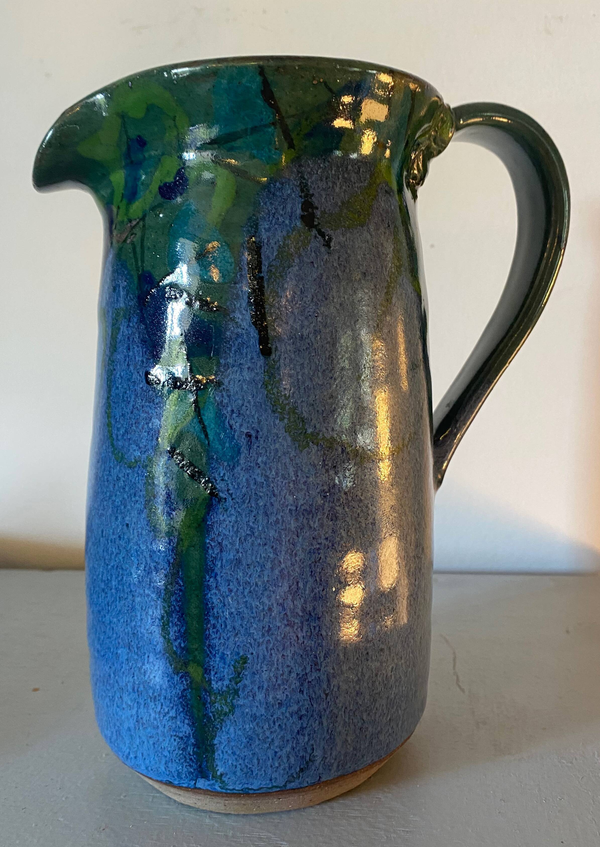 Saint clement-les-places pitcher in blue and green glazed ceramic