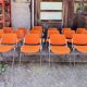 Sérié 39 chaises 4 fauteuils DSC 106 en tissu orange par Giancarlo Piretti pour Castelli