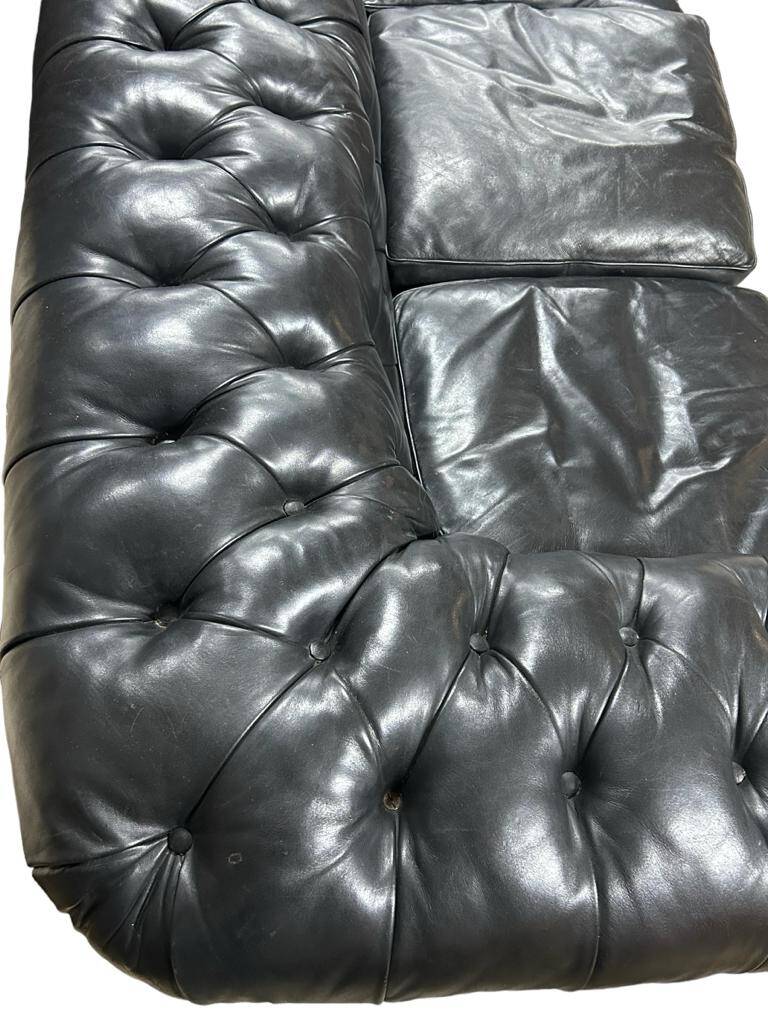 Large and old four-seater leather chesterfield sofa early 20th century l 260 cm