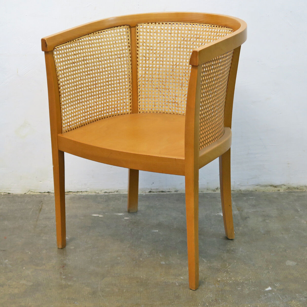 Armchair convertible in caning