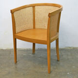 Armchair convertible in caning