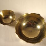 Two brass trundle cups