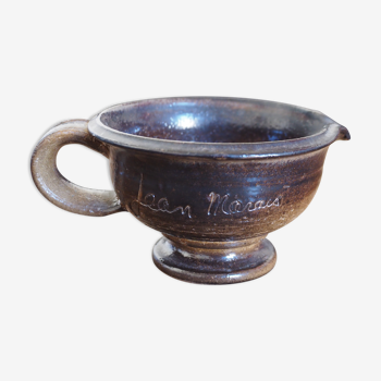 Pot with handle and ceramic spout, signed Jean Marais