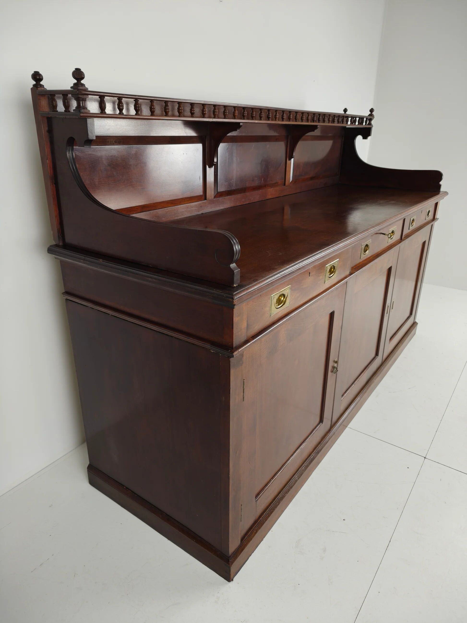 Early 20th-century English mahogany dresser / sideboard – brass campaign hardware