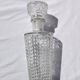 Old relief glass carafe with stopper