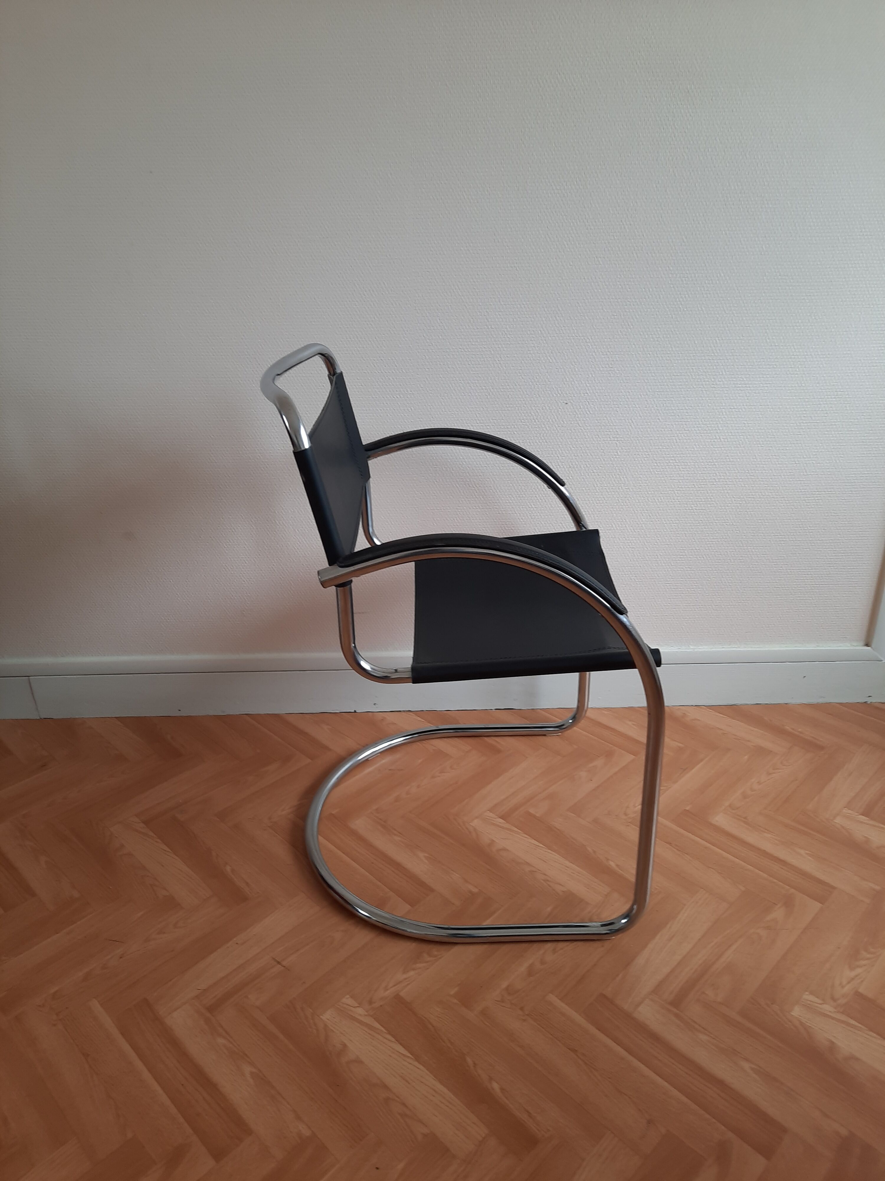 Pair of leather and chrome armchairs made in italy 70s-80s