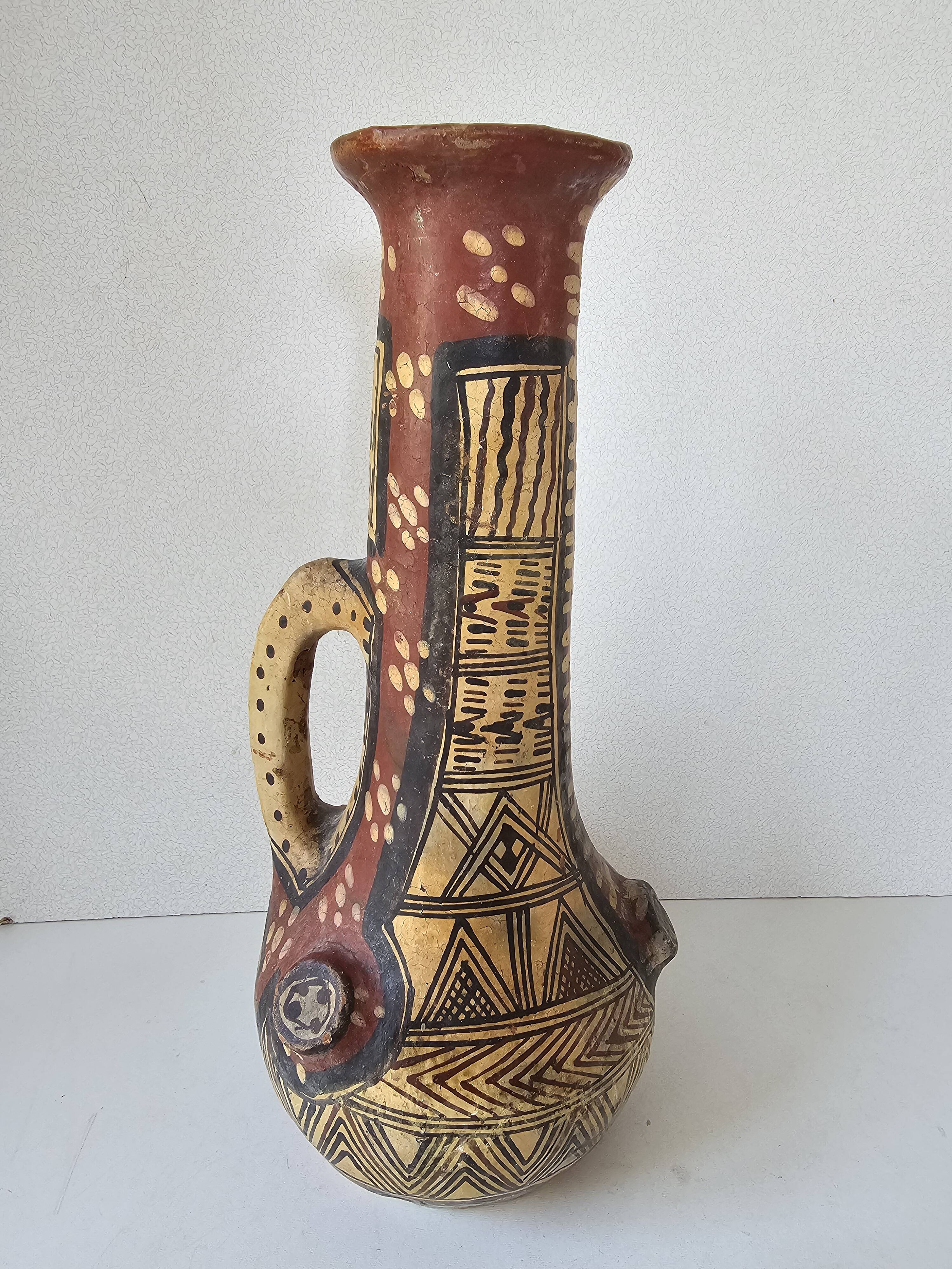 Antique Kabyle Algerian pottery vase with handle and polychrome geometric decorations