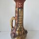 Antique Kabyle Algerian pottery vase with handle and polychrome geometric decorations