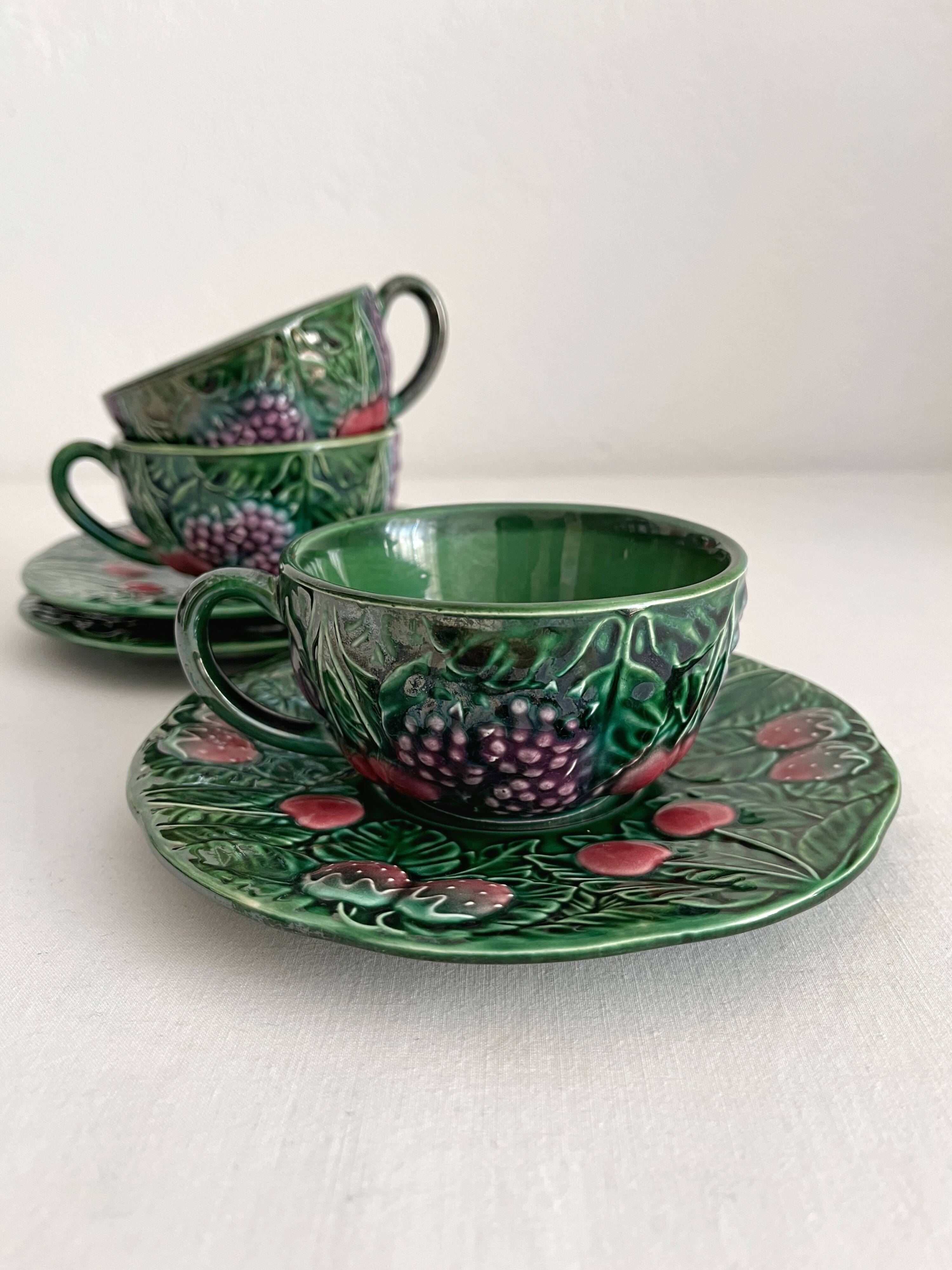 3 earthenware cups and saucers in barbotine fruit decor Salins vintage