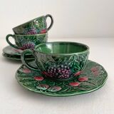 3 earthenware cups and saucers in barbotine fruit decor Salins vintage