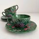 3 earthenware cups and saucers in barbotine fruit decor Salins vintage