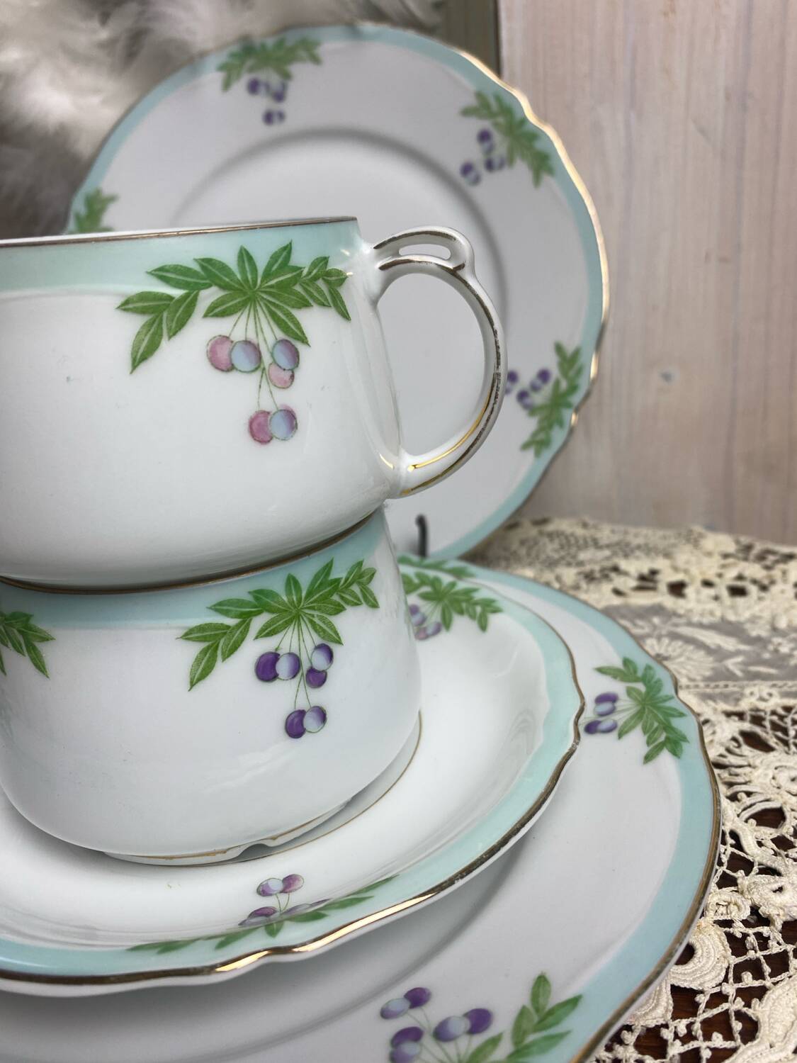 Set of 2 antique porcelain chocolate services.