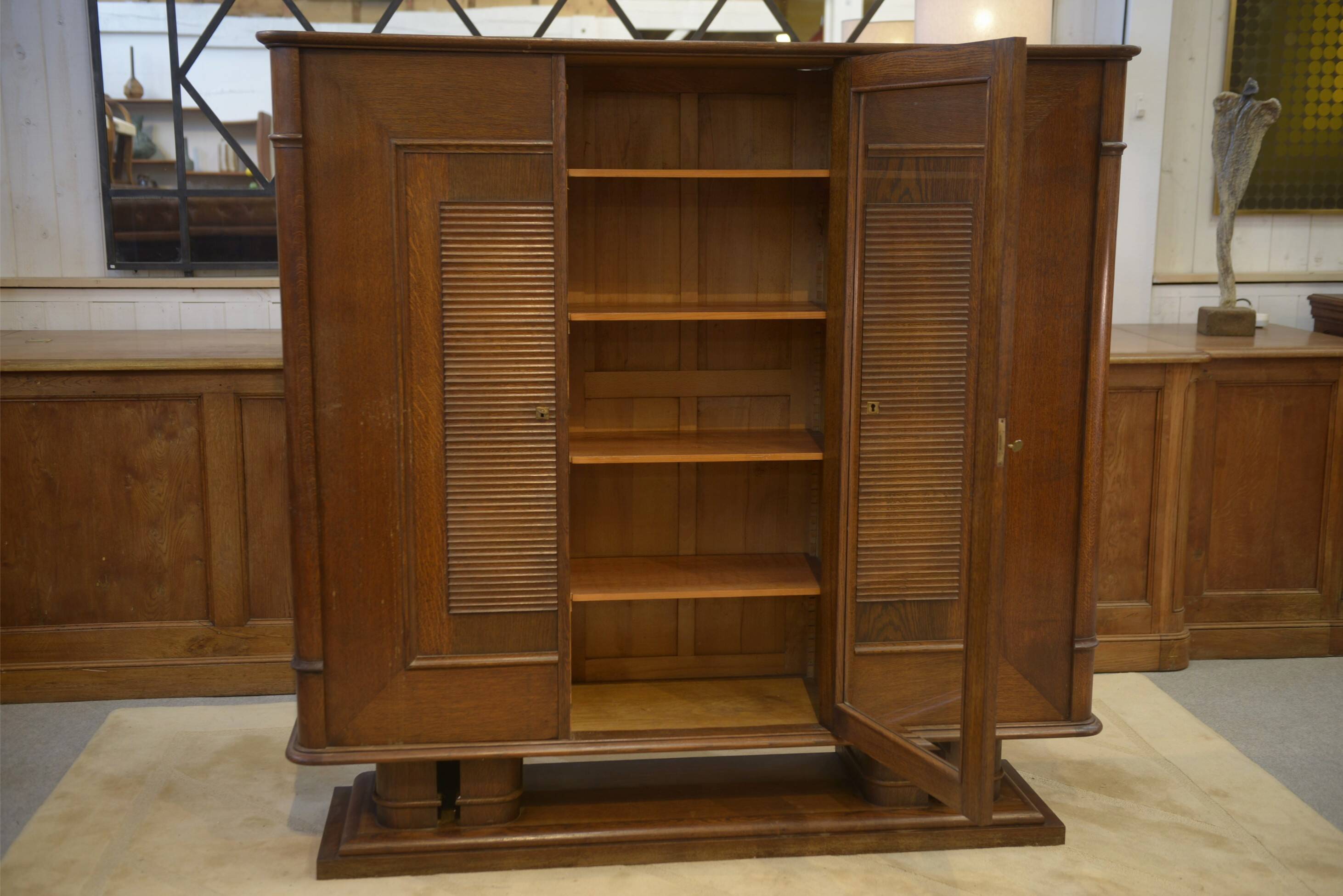 Brutalist display cabinet in oak by Charles Dudouyt, 1940s.