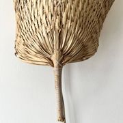 Woven rattan wall light in the style of Igno Maurer, design from the 1970s.
