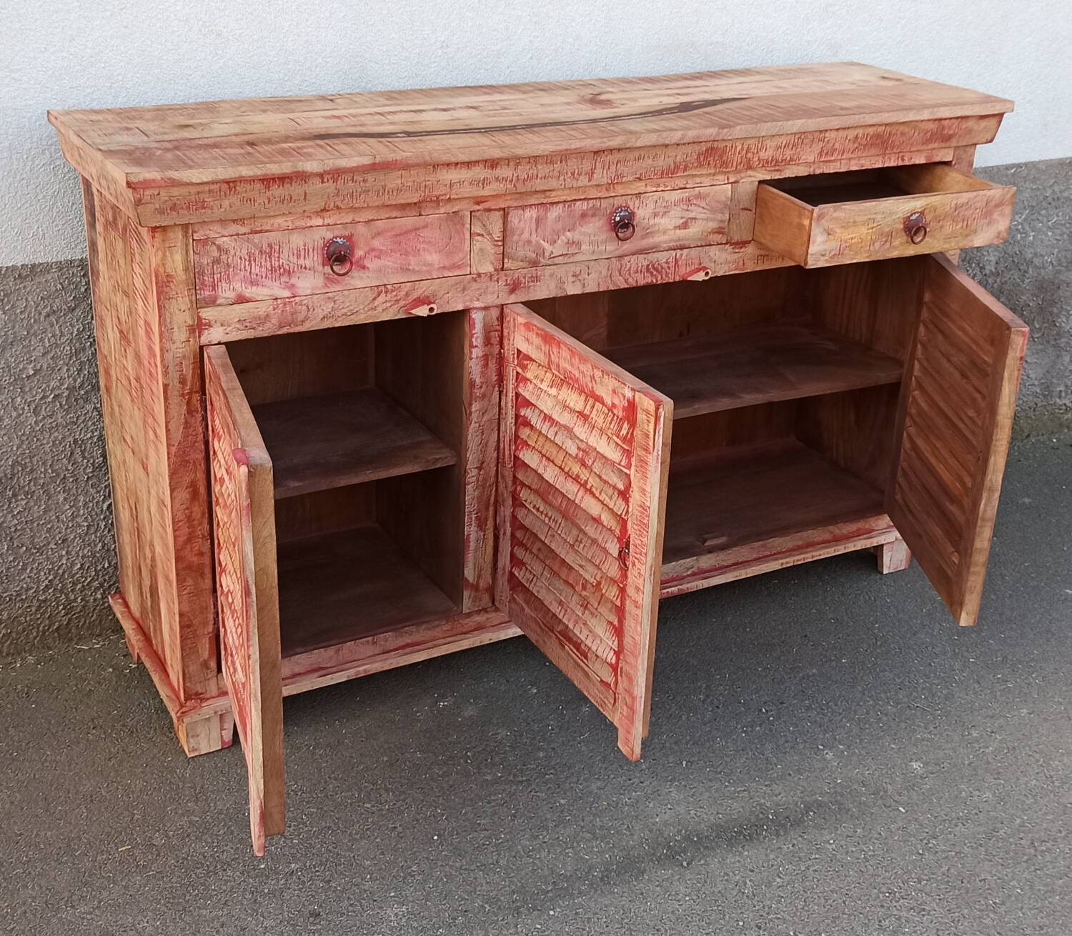 Wooden sideboard with red highlights
