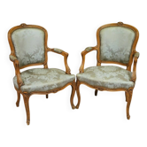 Pair of Louis XV style armchairs in moulded and carved beech.
