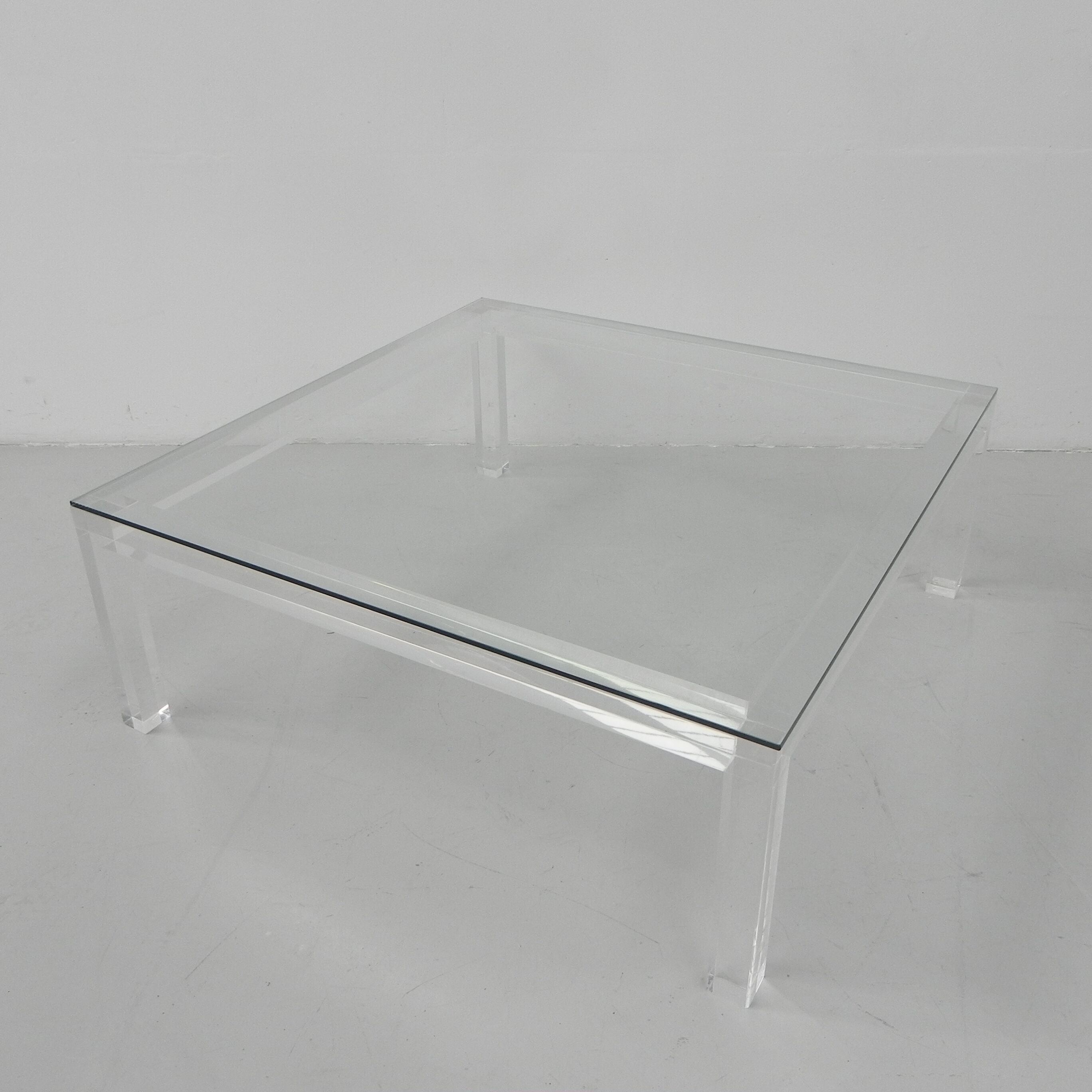 Vintage coffee table on perspex legs