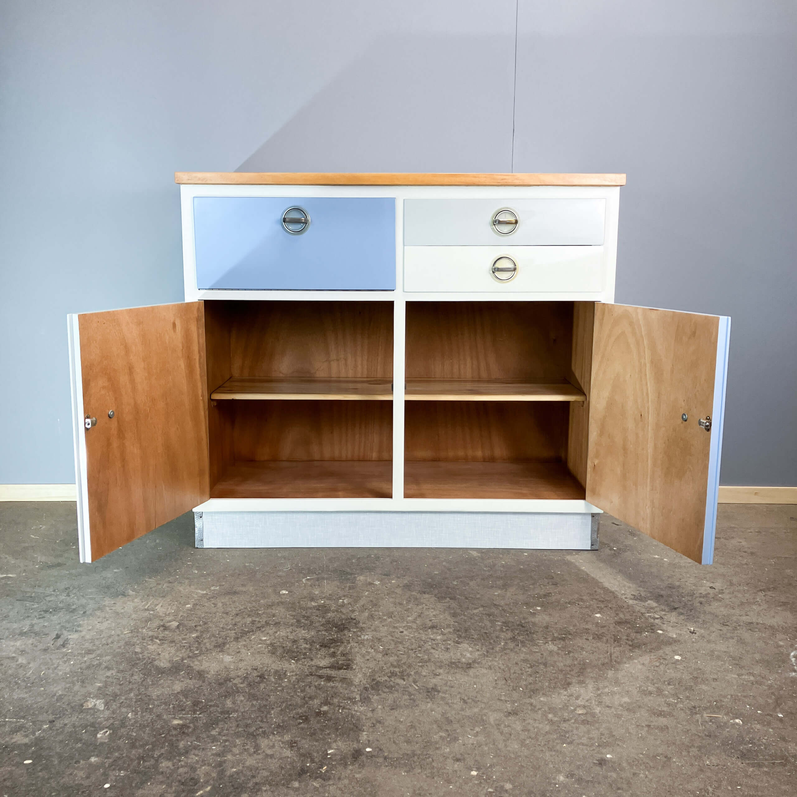Kitchen cabinets, pastel blue and light gray, vintage from the 60s