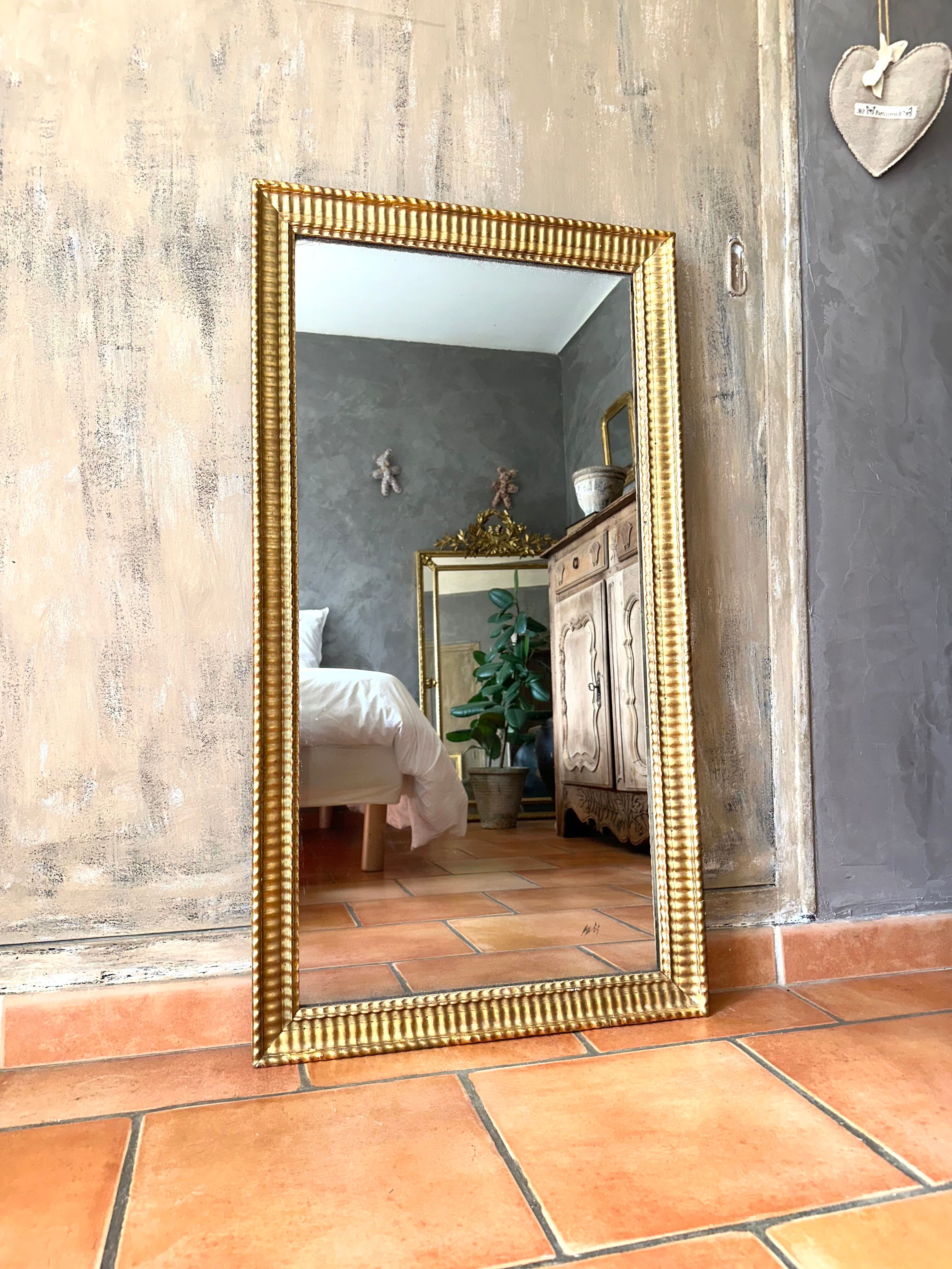 Antique Napoleon III gilded mirror from the 19th century.
