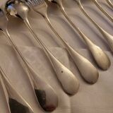 12 couverts de table en métal argenté modèle Baguette