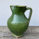 Green glazed terracotta pitcher / potter's ceramic vase