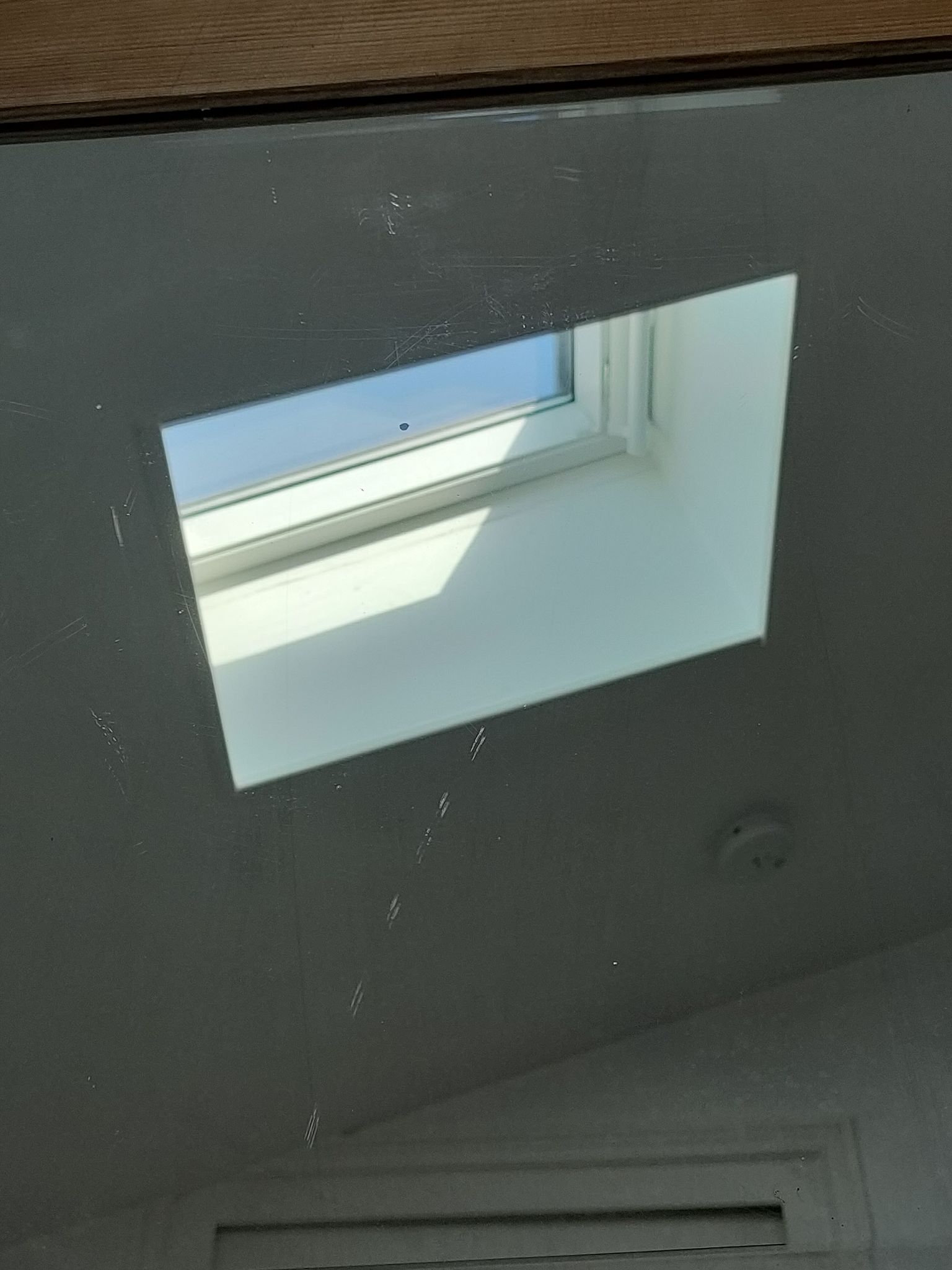 Miroir bois patiné glace biseautée vintage 76 cm x 96 cm