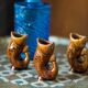 Set of three small brown glass fish, 20th century, Europe, 1960s
