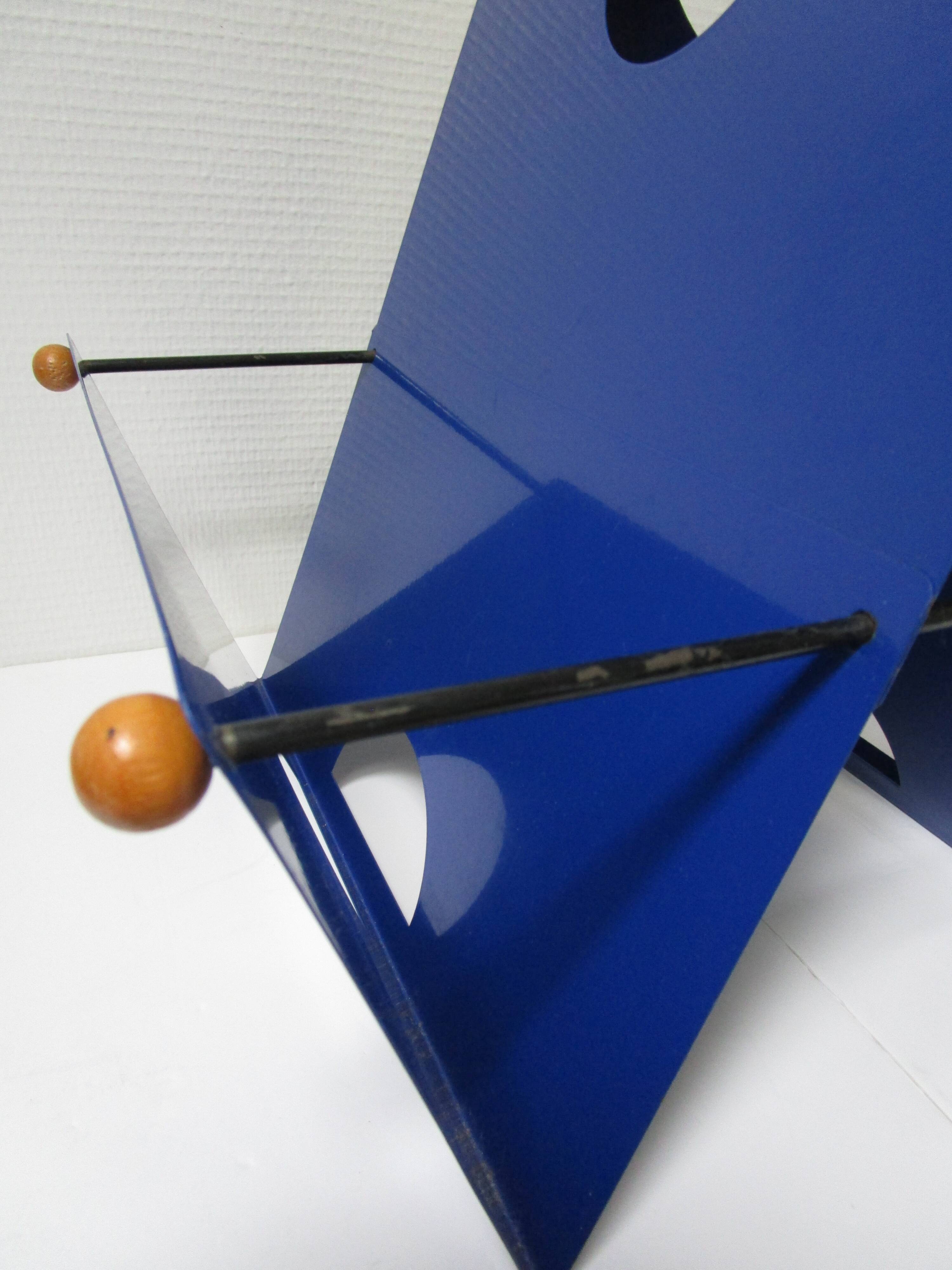 Blue metal magazine holders design 80s