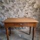 Vintage beech desk with a linoleum top and drawer.