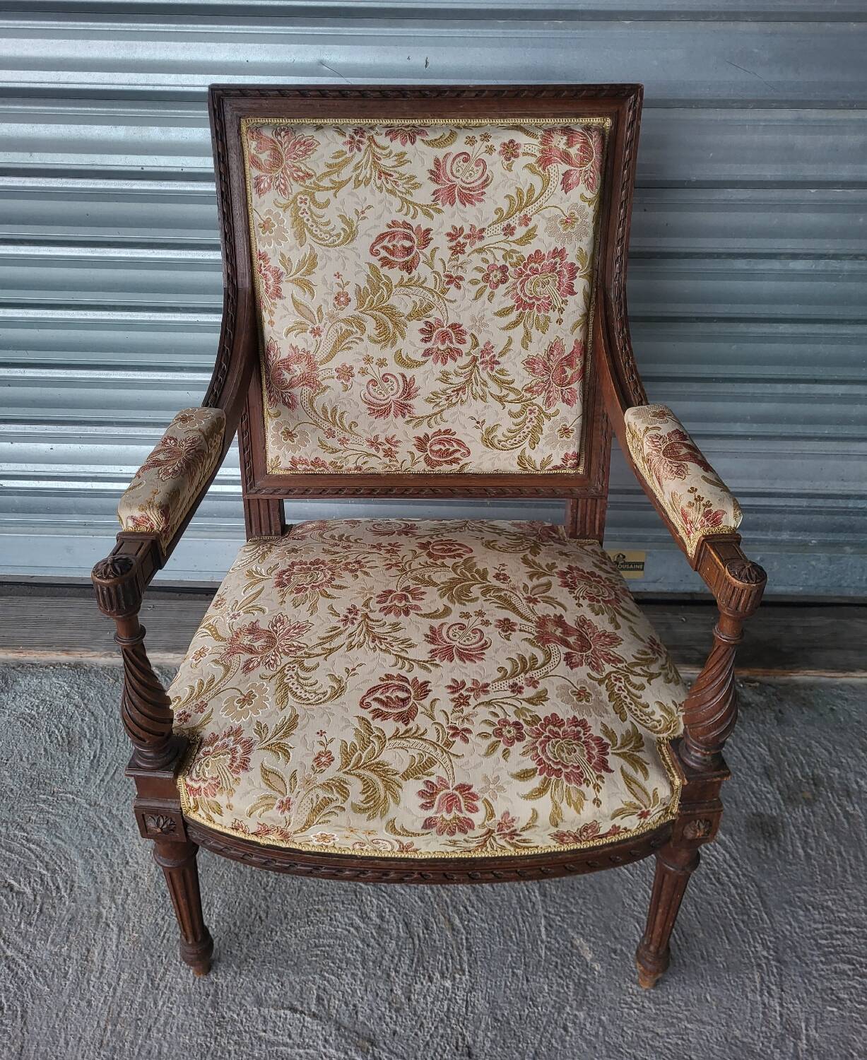 Authentic antique Louis XVI style armchair in good condition.