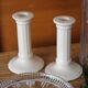 Pair of cream ceramic candlesticks