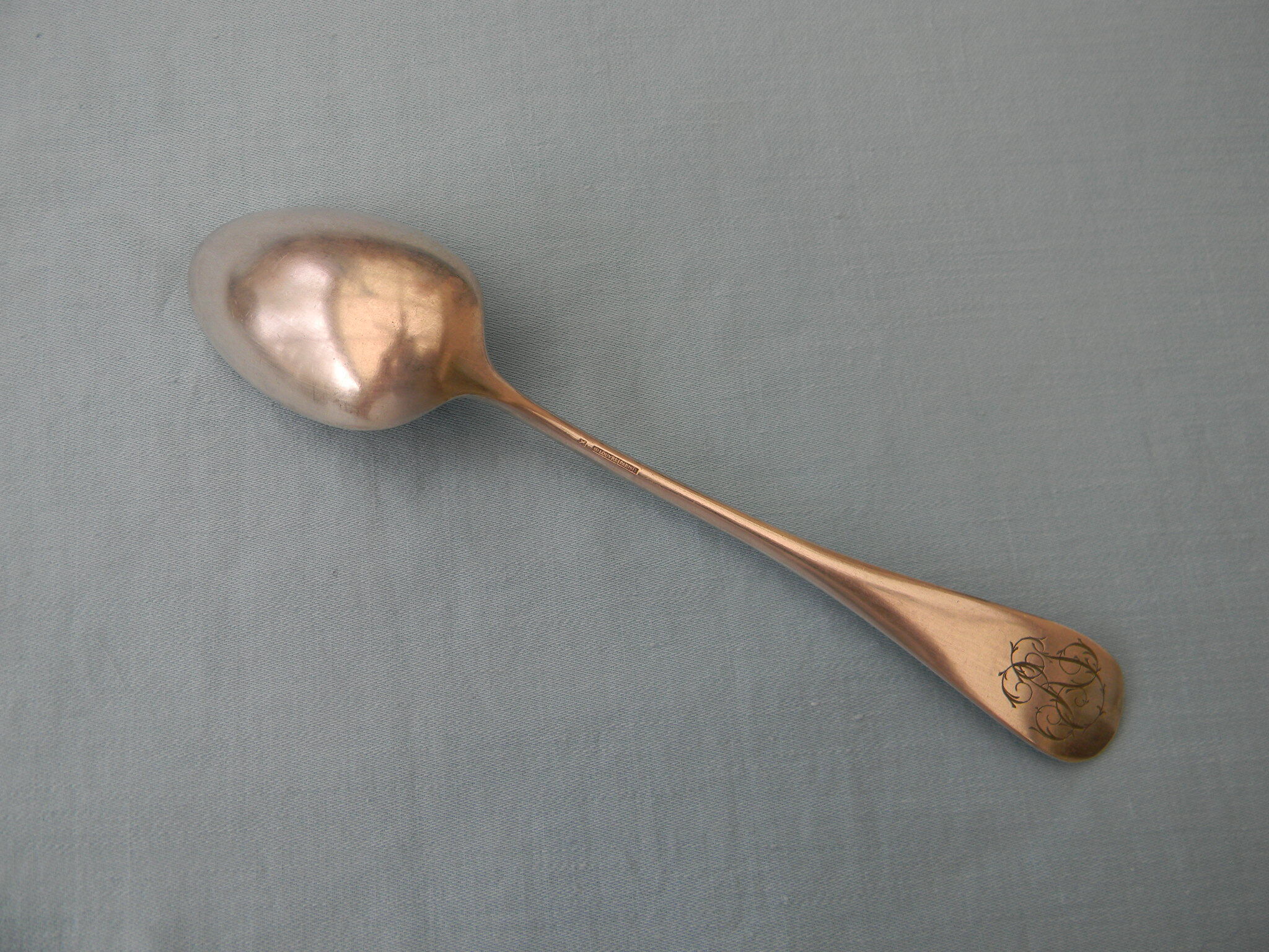 Set of 6 silver metal dessert spoons.