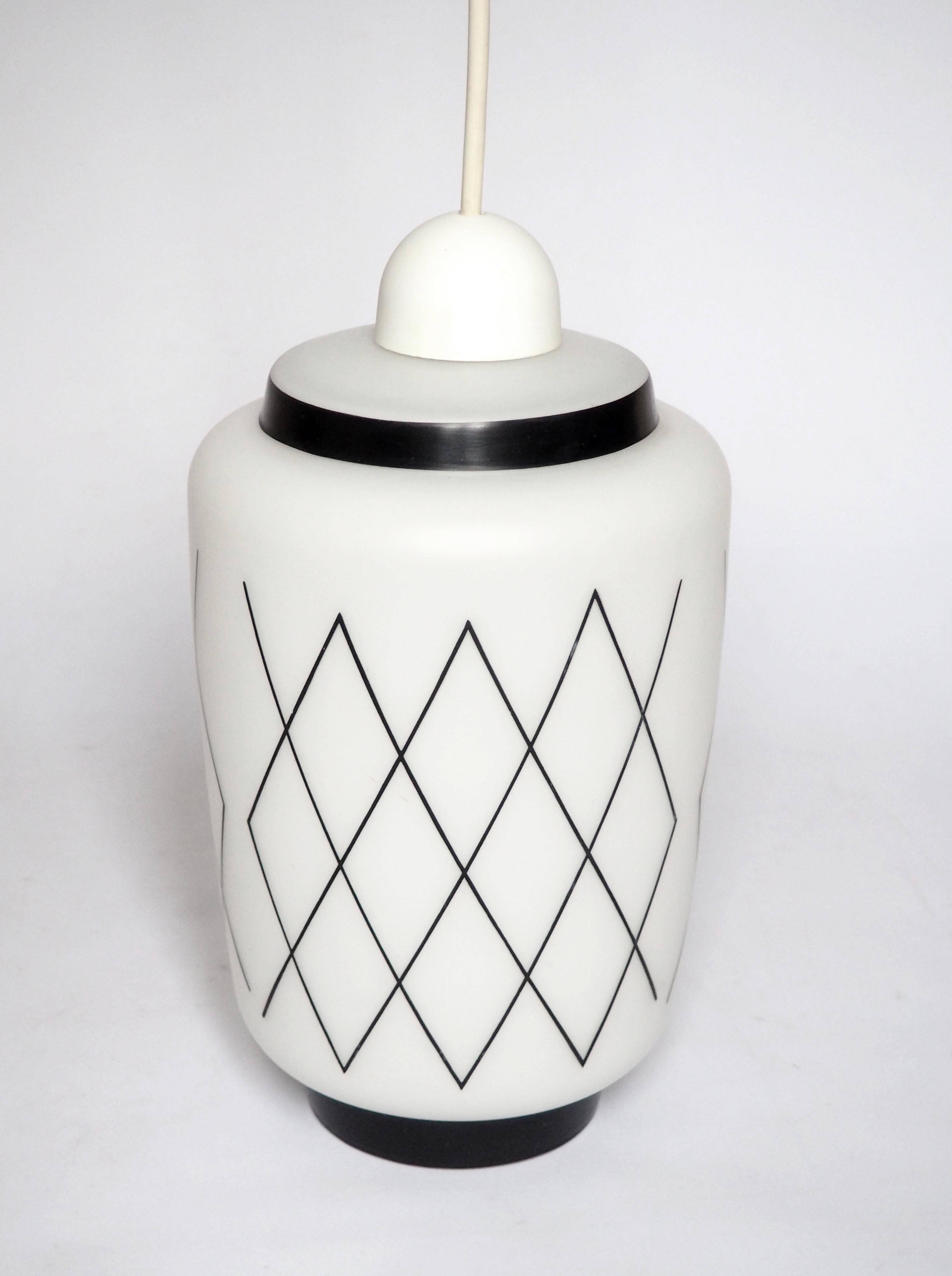 Black and white lantern suspension