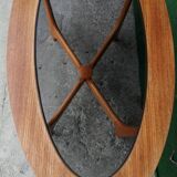 Oval teak coffee table