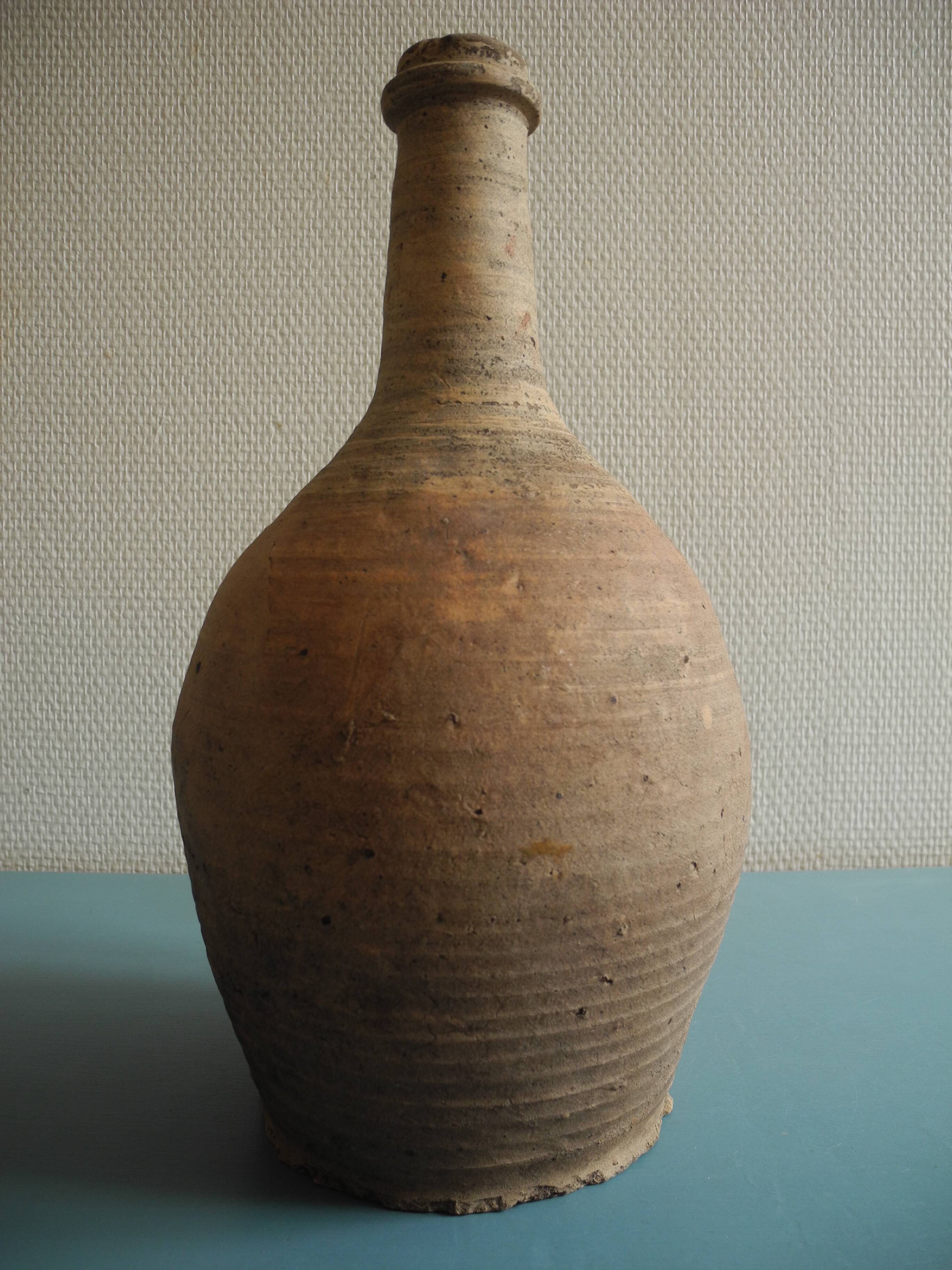 antique rustic decorative terracotta pottery bottle