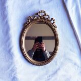 Knot locket mirror