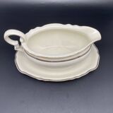 Porcelain sauce boat with black and gold checkered border