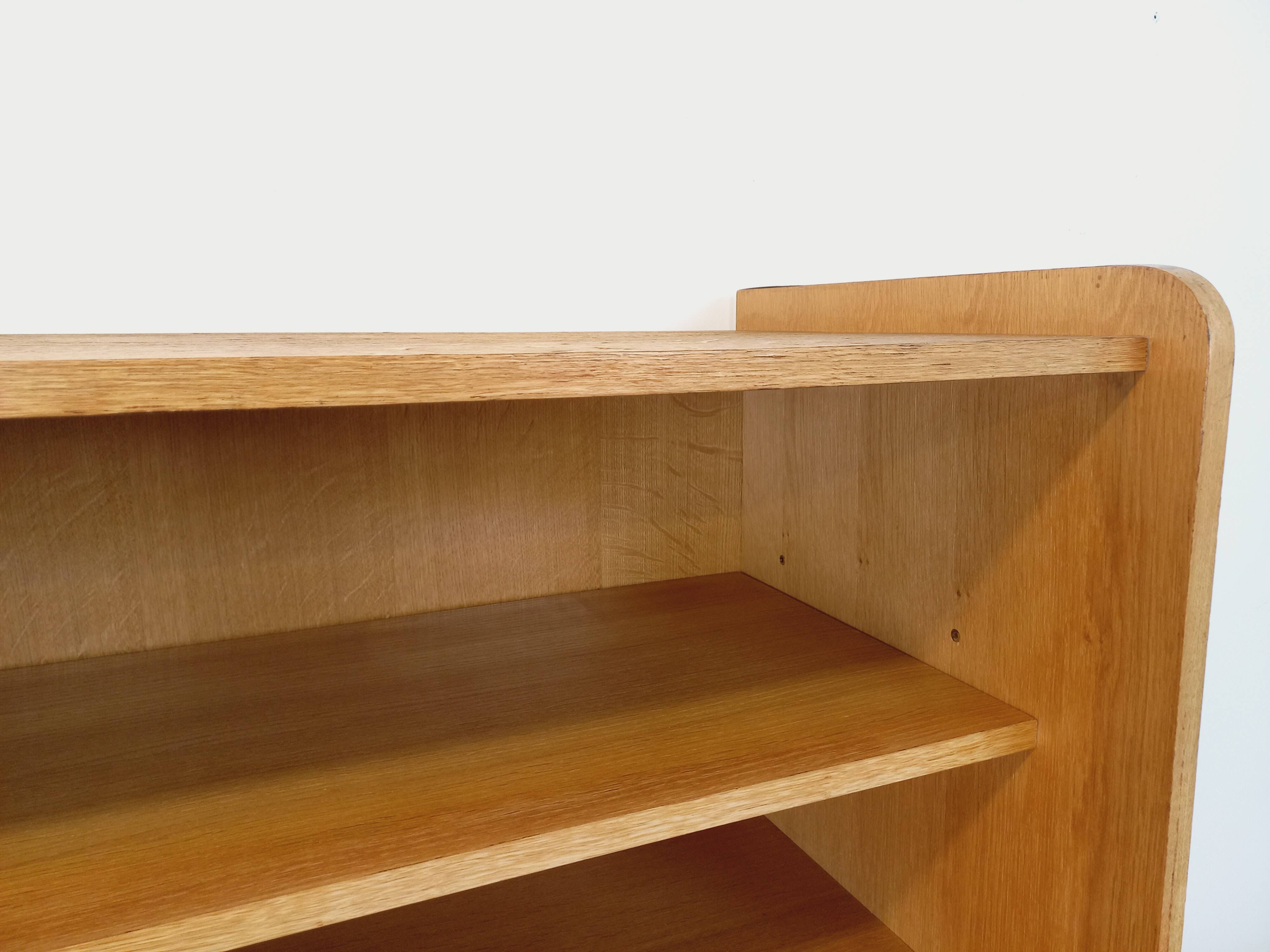 Vintage bookshelf with oak side table.