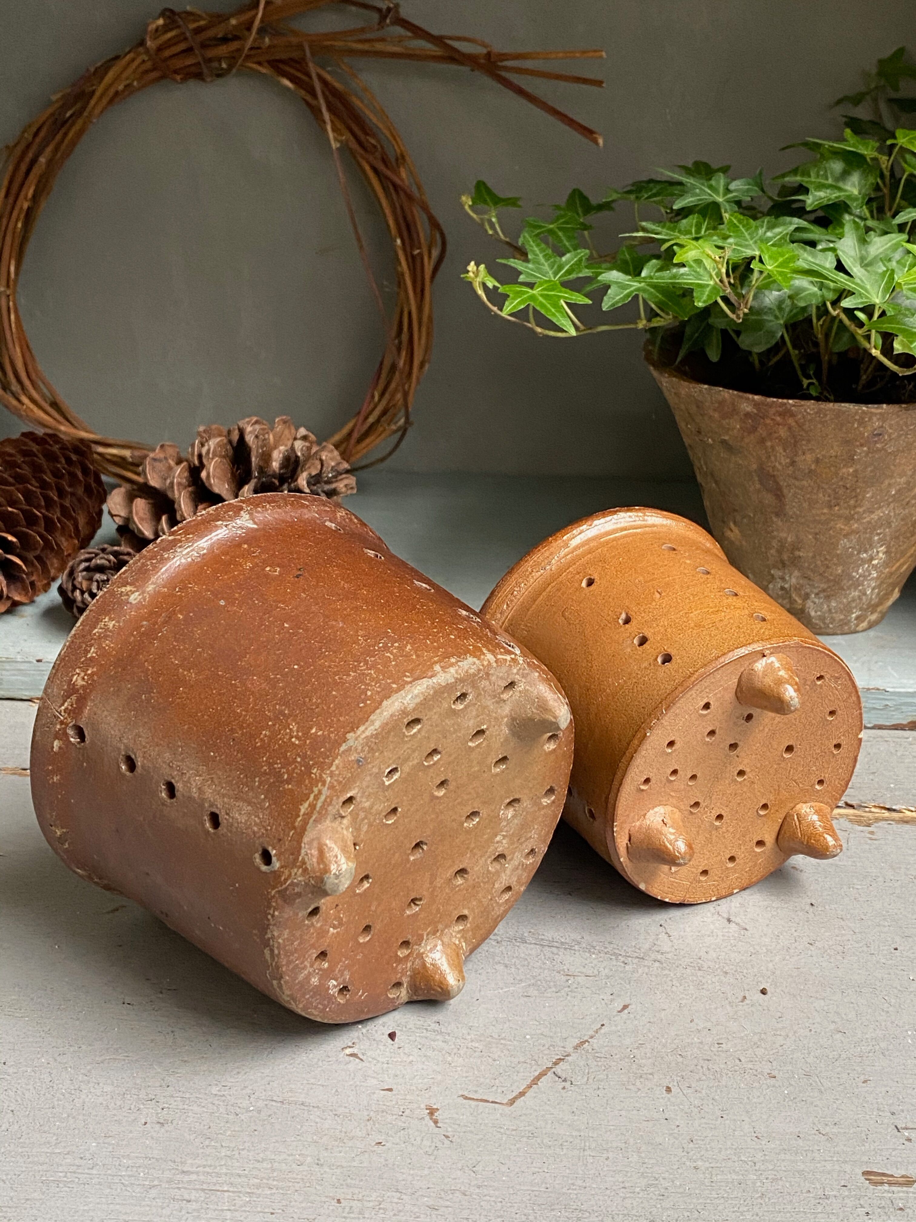 Pair of old faisselle molds