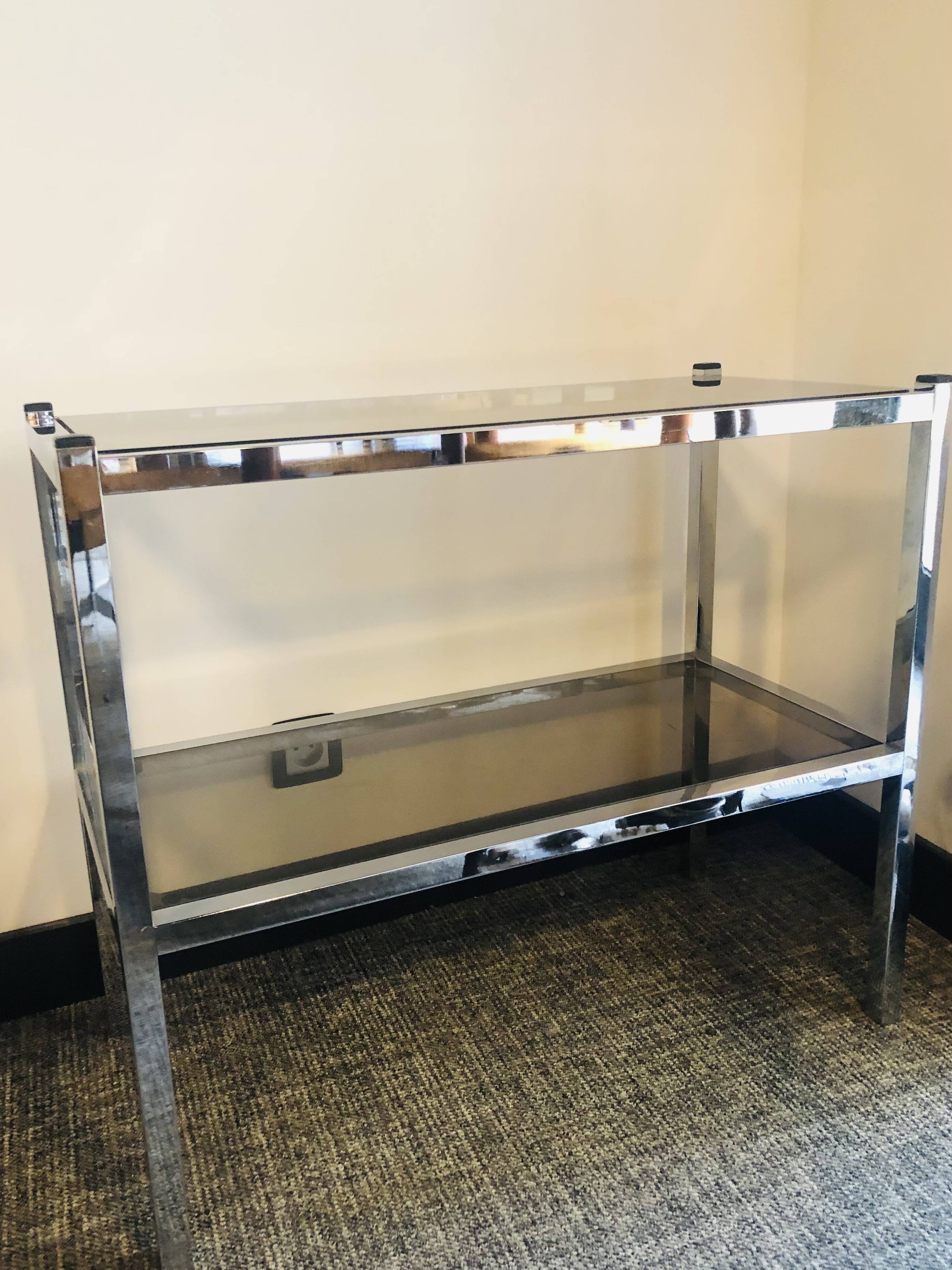 Chrome console and tinted glass