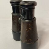 Old pair of XXth leather-wrapped binoculars
