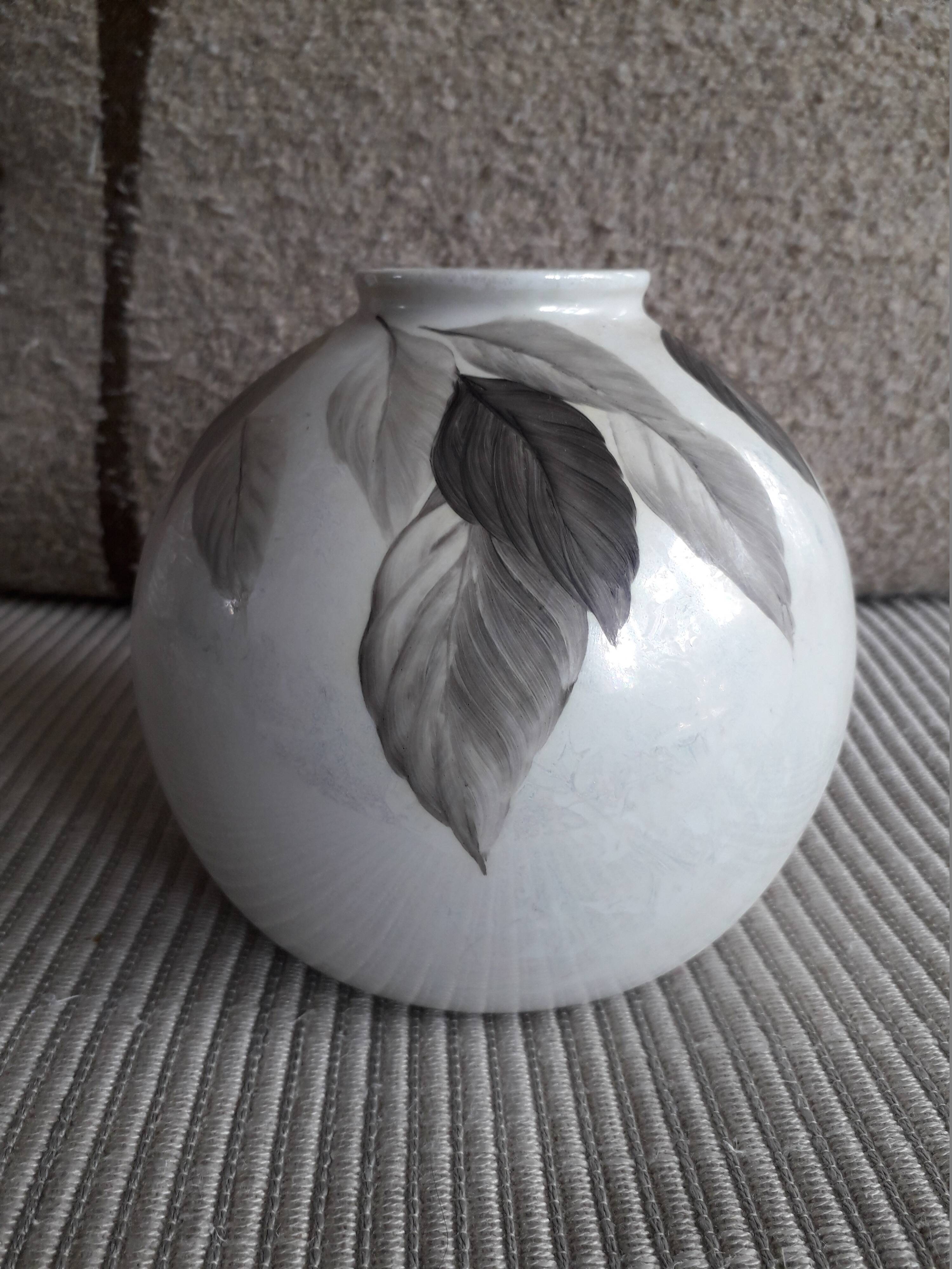 Vintage vase with plant decoration signed